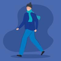 young man with scarf and hat walking vector