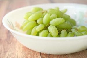 Fresh green grapes in a bowl photo