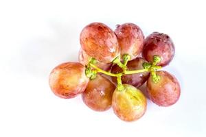 uvas aisladas sobre fondo blanco foto