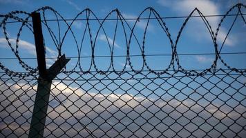 Razor wire fence photo