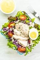 Grilled chicken breast and salad photo