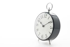 Alarm clock on on white background photo