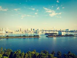 Beautiful cityscape with Rainbow bridge in Tokyo city, Japan photo