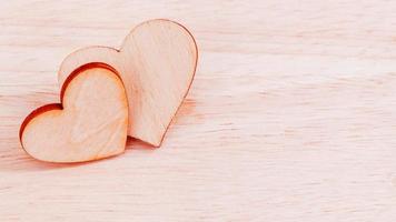 Two wooden hearts photo
