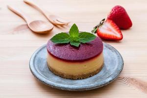 Strawberry cheesecake with fresh mint photo