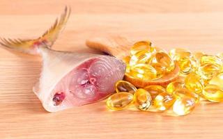 Cod liver oil capsules and fish