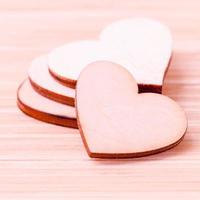 Stack of wooden hearts photo