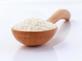 Japanese rice in a wooden spoon photo