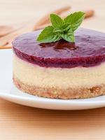 Blueberry cheesecake with fresh mint photo