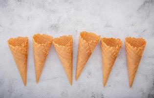 Ice cream cones on a light gray background photo