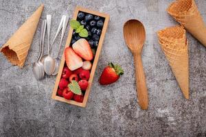 Waffle cones with berries photo