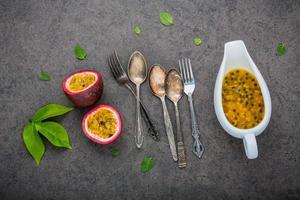 Passion fruit with utensils photo