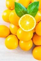 Fresh oranges on the table photo