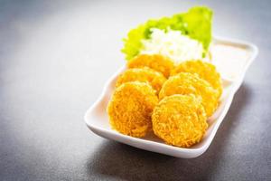 Deep fried shrimp balls with vegetable photo