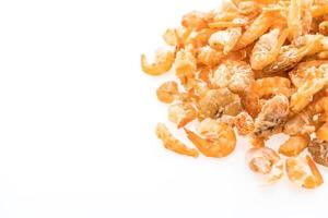 Raw dry shrimp on white background photo