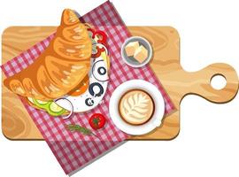 Top view of croissant sandwiches on a cutting board vector