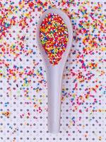 Rainbow sprinkles in a spoon photo