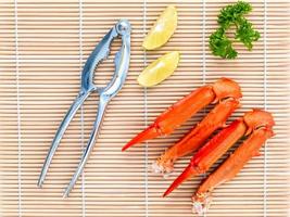 Crab claws with lime and parsley photo