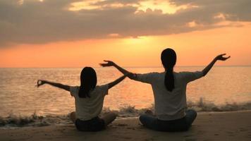 Family doing yoga. video