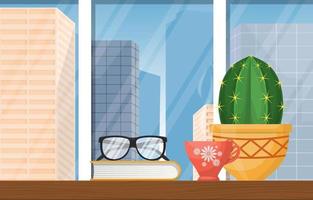 Hot Tea, Cactus, and Book on Table with City Skyline vector