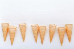 Waffle cones on white photo