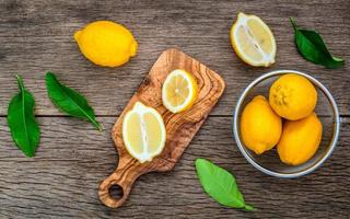 Fresh lemons on a cutting board photo