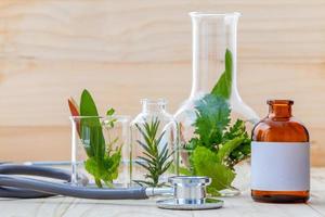 Herbs in bottles with a stethoscope photo