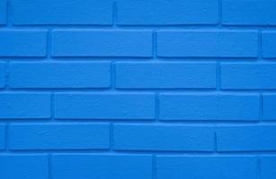 Una pared de ladrillo azul índigo, fondo de textura de construcción foto
