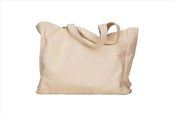 Blank Eco Friendly Beige Colour Fashion Canvas Tote Bag for branding,  Isolated on White Background. Clear reusable Bag for Groceries mock up.  Empty linen fabric tote bag for template. Front View. Stock