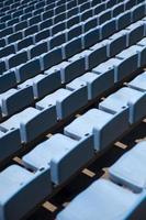 Closeup detail of the blue stadium seats photo