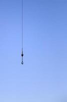 Lifting hook on a crane photo
