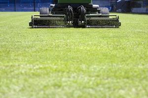 Lawnmower on the stadium photo