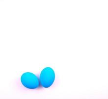 Blue eggs isolated on a white background photo