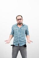 Handsome Man holding up his hands showing he has nothing isolated on white background photo