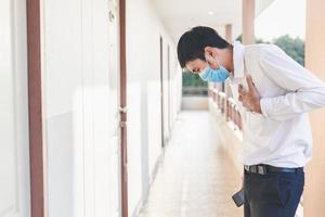 Asian man wearing a mask photo