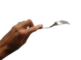 Hand holding wooden fork isolated in white background
