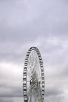 Ferris wheel under cloudy sky photo