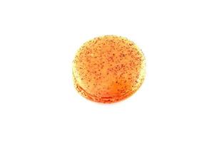 Orange macaroon isolated on white background photo