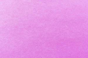 Primer plano del patrón de textura de papel rosa claro para el fondo foto