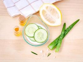 Homemade skin care with aloe vera, lemon, cucumber, sea salt  and honey photo