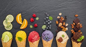 Ice cream and toppings on slate photo