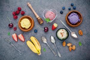 Ice cream with fruit and nuts flat lay photo