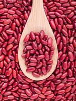 Red kidney beans on a spoon photo