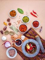 Top view of spices and a mortar photo