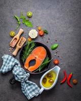 Salmon with various herbs and seasoning photo