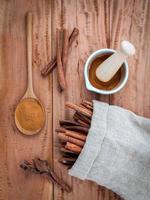 Cinnamon sticks and ground cinnamon photo