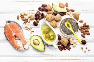 Top view of healthy foods on a shabby white background photo