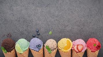 Ice cream cones and fruit with copy space photo