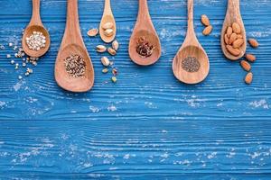 Nuts and grains on a blue background photo
