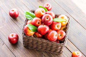 Red apples in basket photo